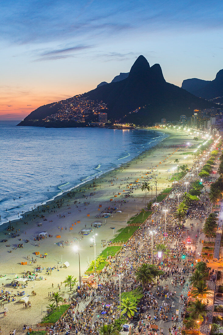 Sunset over Ipanema Beach and Dois Irmaos (Two Brothers) mountain, Rio de Janeiro, Brazil, South America