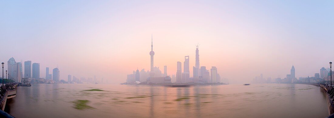 Pudong skyline across Huangpu River, including Oriental Pearl Tower, Shanghai World Financial Center, and Shanghai Tower, Shanghai, China, Asia 