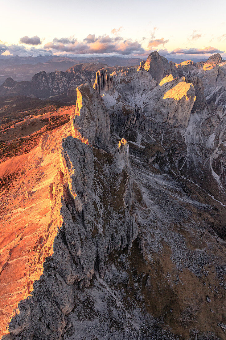 Aerial view of the rocky peaks of Roda Di Vael at sunset, Catinaccio Group (Rosengarten), Dolomites, South Tyrol, Italy, Europe