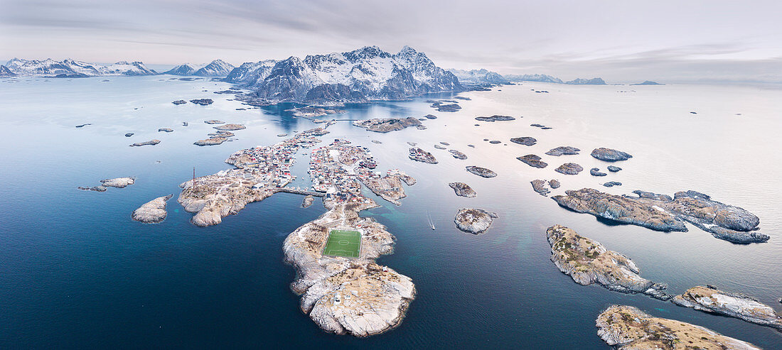 Panoramic aerial view of soccer pitch and islets, Henningsvaer, Vagan municipality, Lofoten Islands, Nordland, Norway, Europe