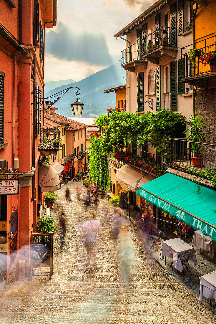 Tourists walk stairs in Bellagio, Province of Como, Lake Como, Italian Lakes, Lombardy, Italy, Europe