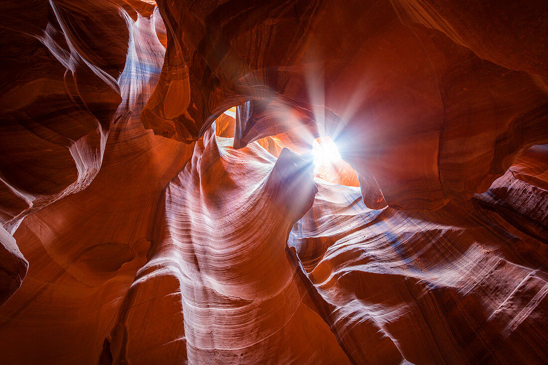 Red rock formations with sunlight in the slot canyon of the Upper Antelope Canyon near Page, USA