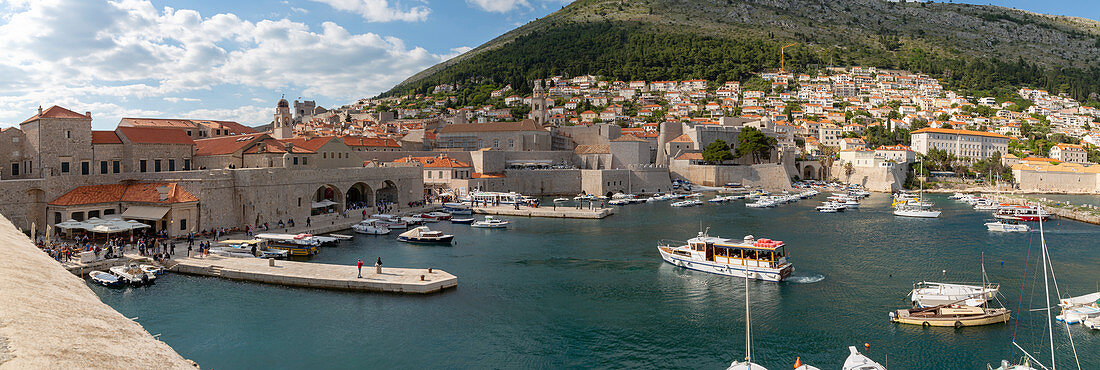 View of boats in harbour of Dubrovnik Old Town from the wall, UNESCO World Heritage Site, Dubrovnik, Dalmatia, Croatia, Europe