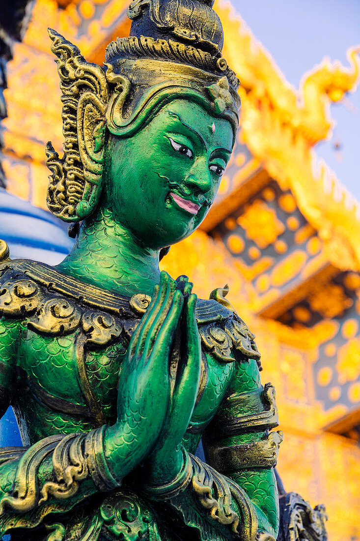 Green Yaksha statue at Wat Rong Suea Ten (Blue Temple) in Chiang Rai, Thailand, Southeast Asia, Asia