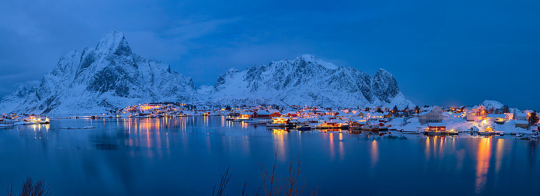 Panoramic of Reine fishing village at night in winter, Reinefjord, Moskenesoya, Lofoten, Arctic, Norway, Europe
