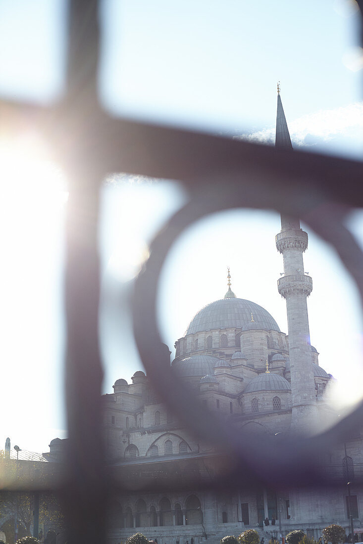 Looking through a fence at the blue blue mosque in Istanbul, Turkey