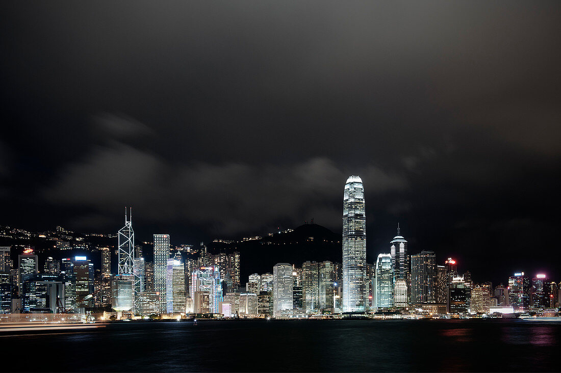 View across Victoria Harbor to Central night skyline, Hong Kong, China