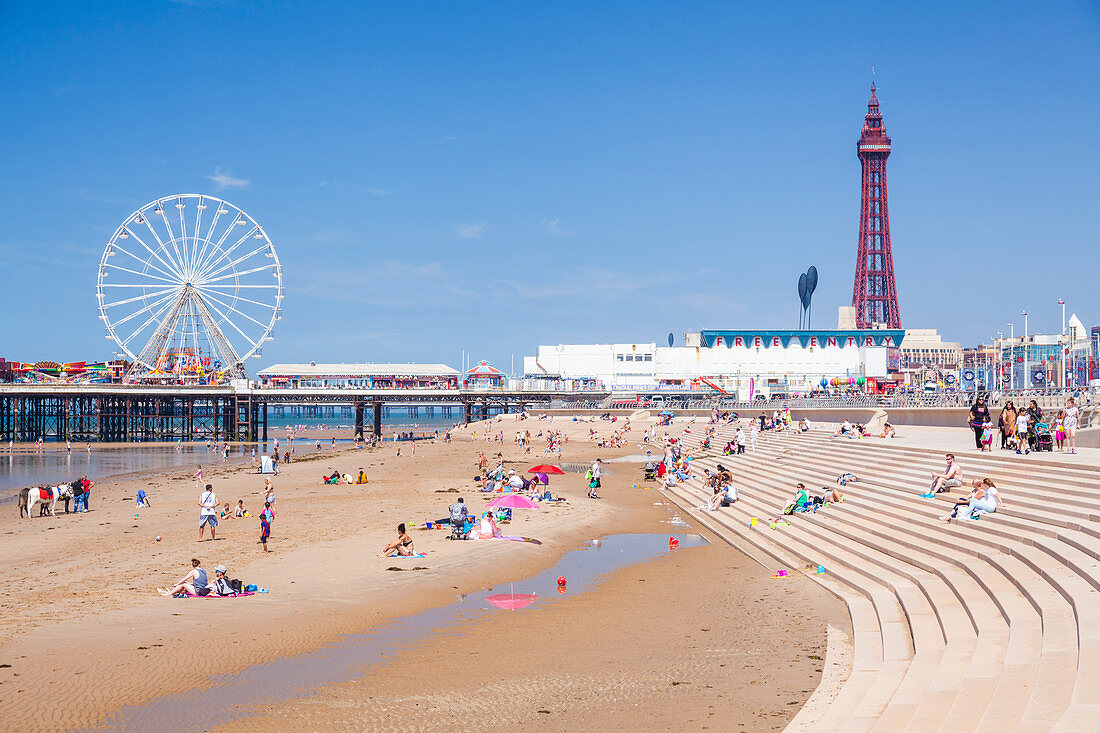 Blackpool Tower, Blackpool Beach, Blackpool Central Pier with holidaymakers and tourists, Blackpool, Lancashire, England, United Kingdom, Europe