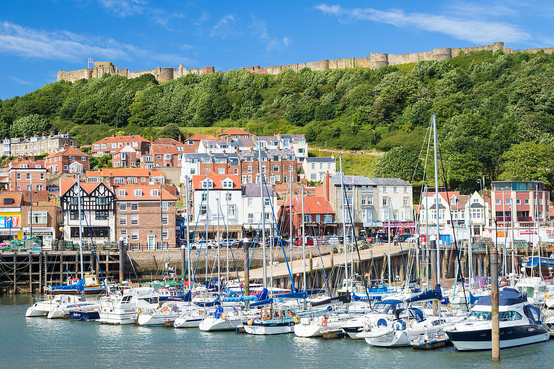 Scarborough harbour, marina and castle in south bay, Scarborough, North Yorkshire, England, United Kingdom, Europe
