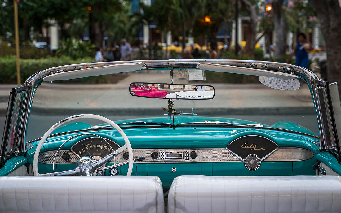Vintage American taxi car interior, Havana at dusk, La Habana, Cuba, West Indies, Caribbean, Central America