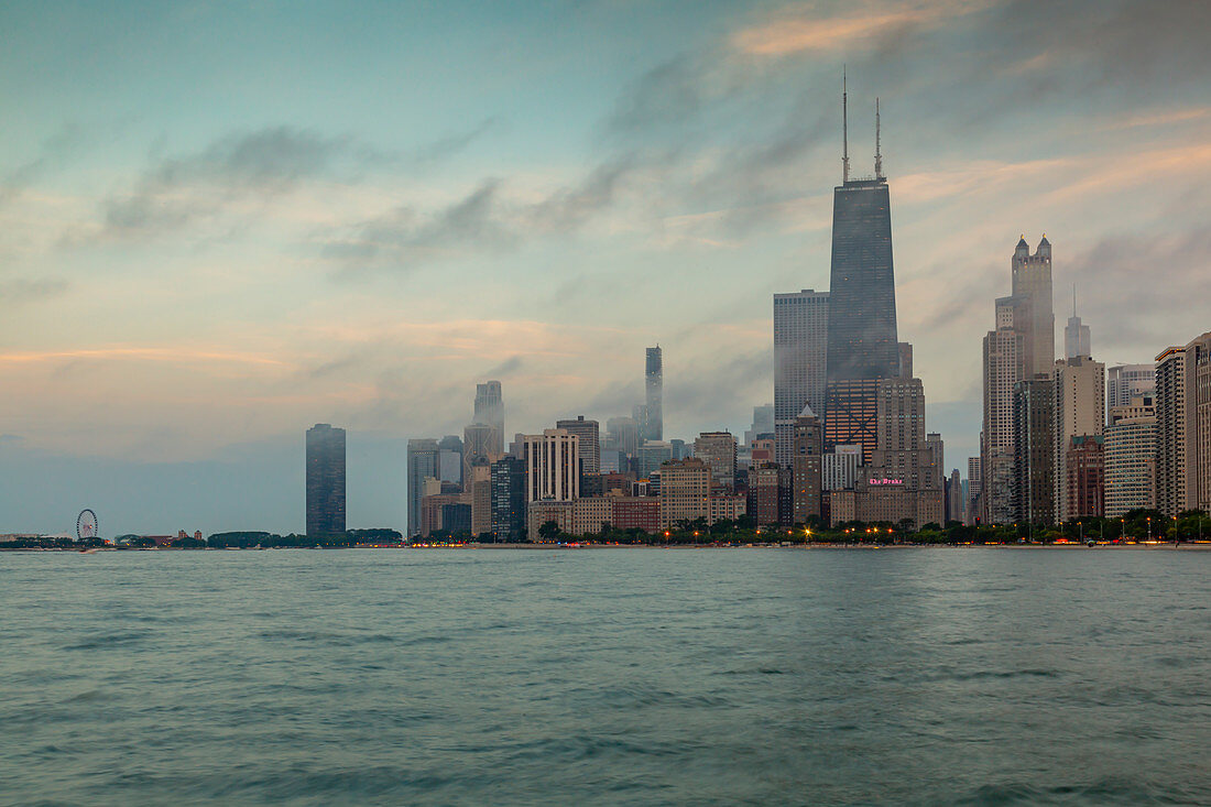 View of Chicago skyline from North Beach at dusk, Downtown Chicago, Illinois, United States of America, North America