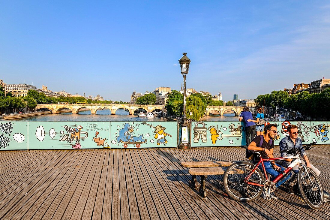 France, Paris, area listed as World Heritage by UNESCO, the Passerelle des Arts, tempory panels for railing decorated by street art