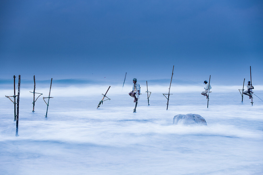 Stilt fishermen, Mirissa, Sri Lanka, Asia