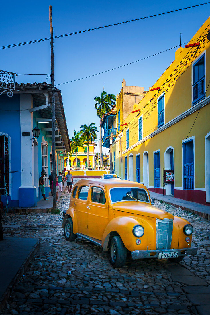 Yellow taxi in Trinidad, UNESCO World Heritage Site, Sancti Spiritus, Cuba, West Indies, Central America