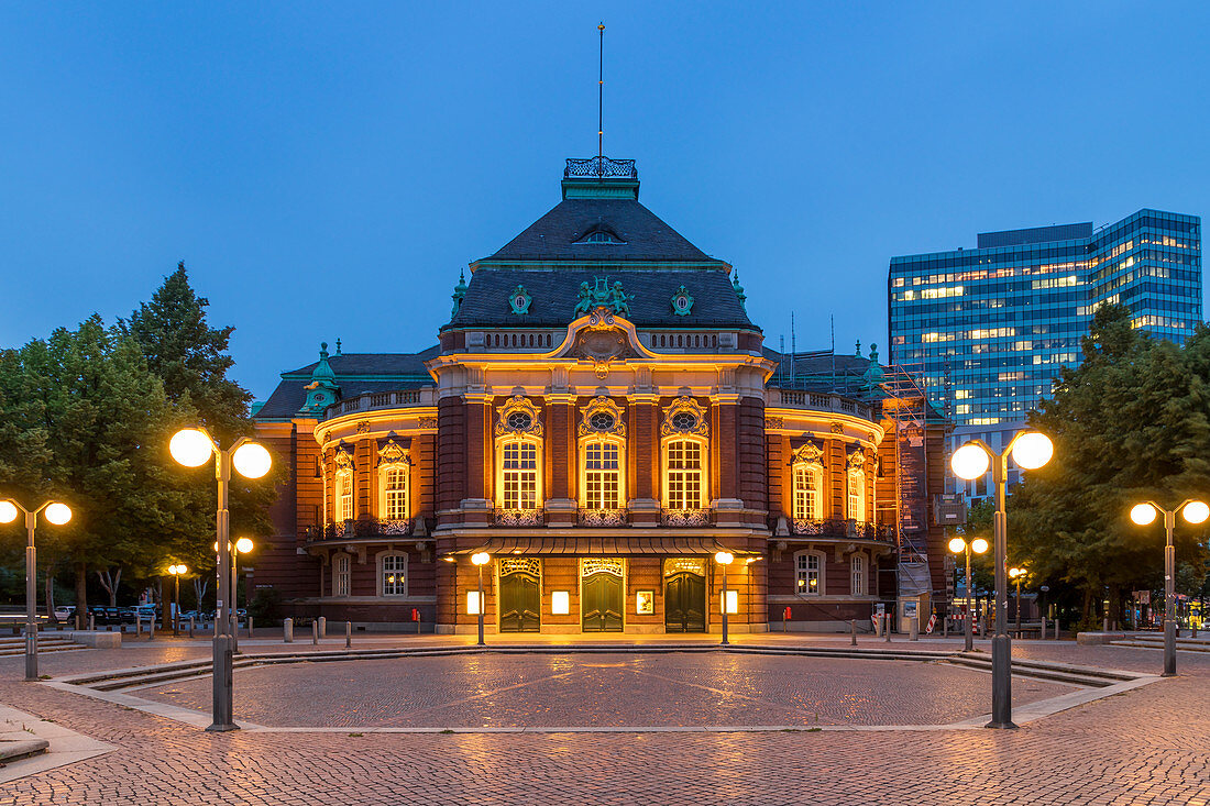 The illuminated Laeiszhalle concert hall at Johannes Brahms Square during dusk, Hamburg, Germany, Europe