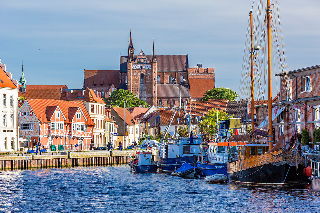 Old Town in Wismar viewed from Alter Hafen (old port), On the left half-timbered house called GewÃ¶lbe (vault), Fachwerkhaus, Runde Grube, St. Georgen church, Wismar stadt, Mecklenburgâ€“Vorpommern, Germany.