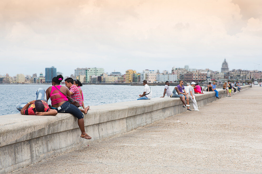 Cubans on the Malecón promenade in Havana, Cuba