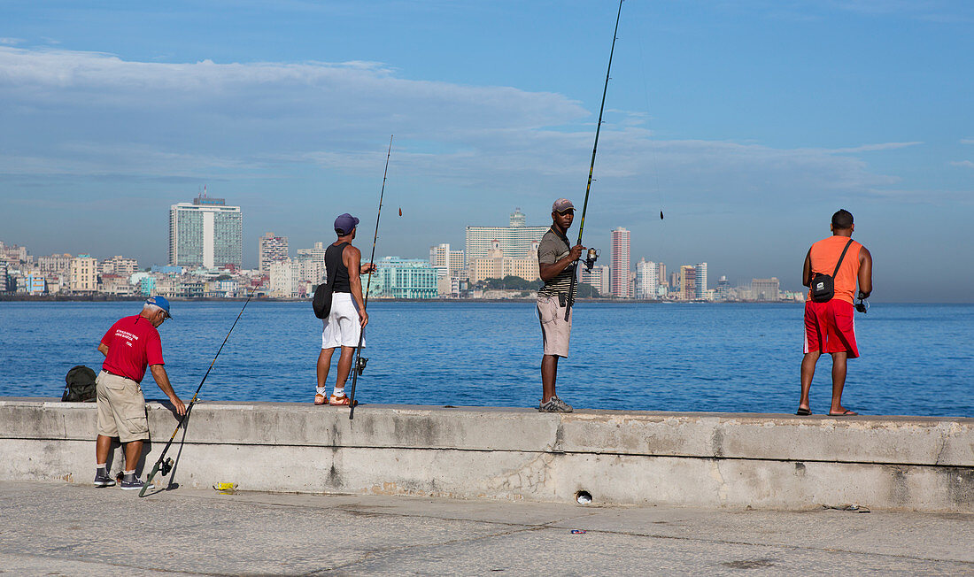 Cuban anglers on the Malecón of Havana, Cuba