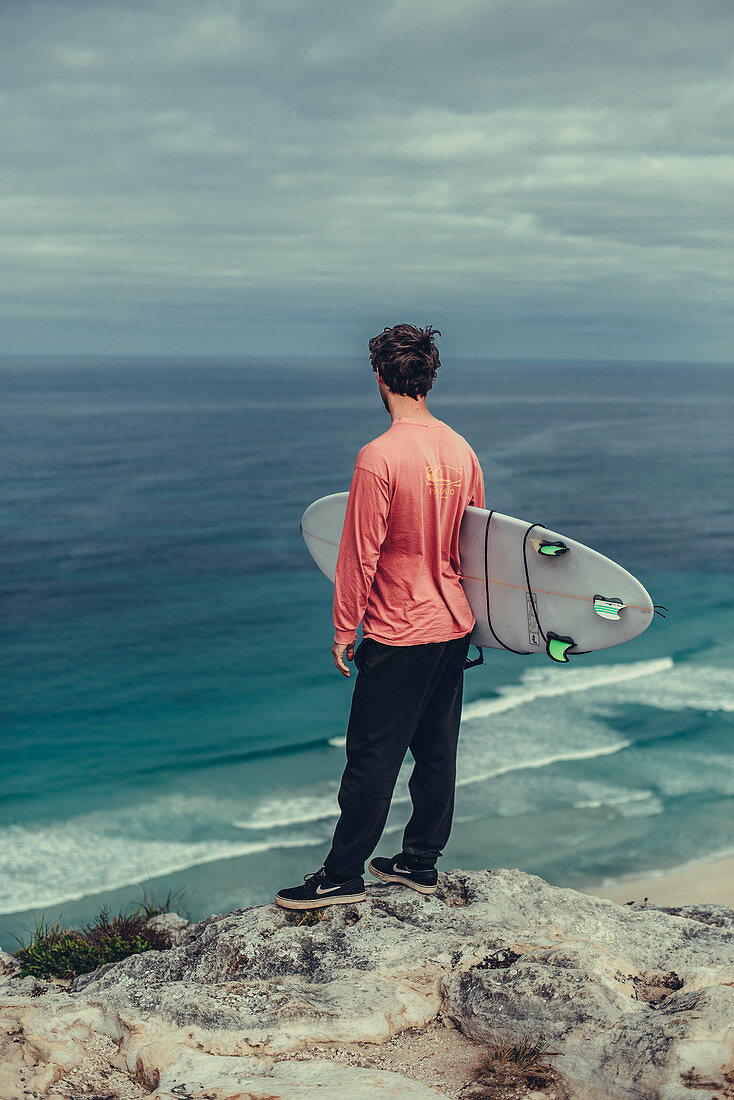 Surfers on the bay of Contos at Margaret River, Western Australia, Australia, Oceania