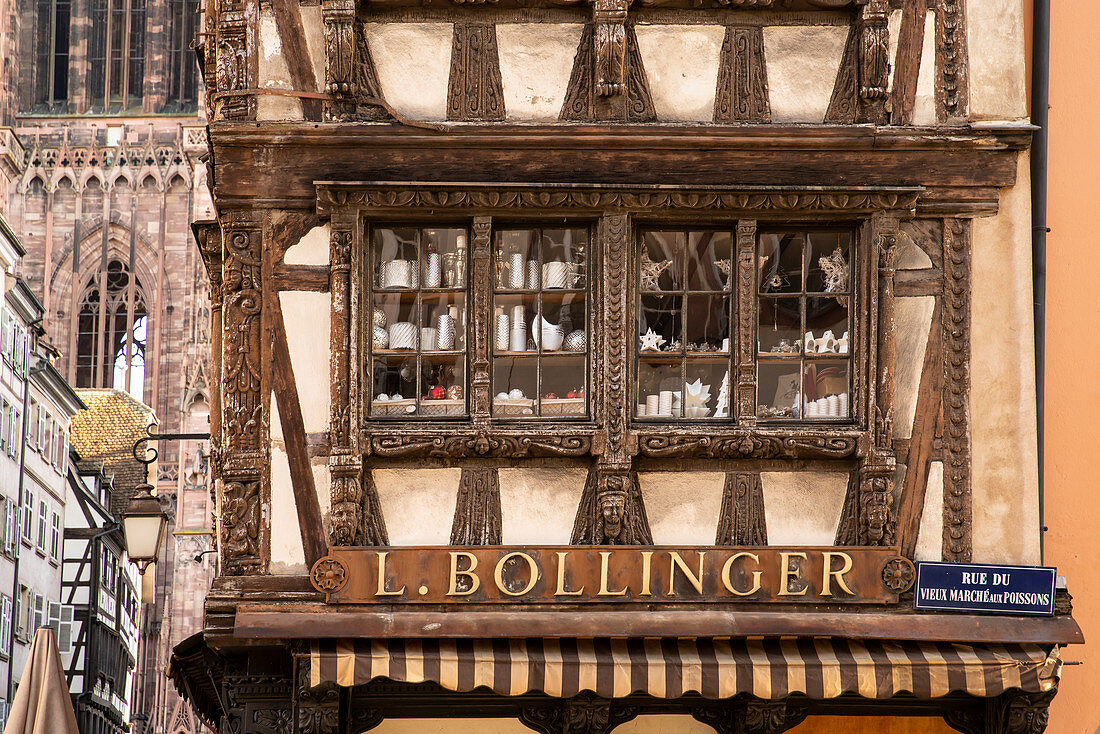 Detail with half-timbered window of half-timbered house with shop L. Bollinger, Strasbourg, Alsace-Champagne-Ardenne-Lorraine, France, Europe