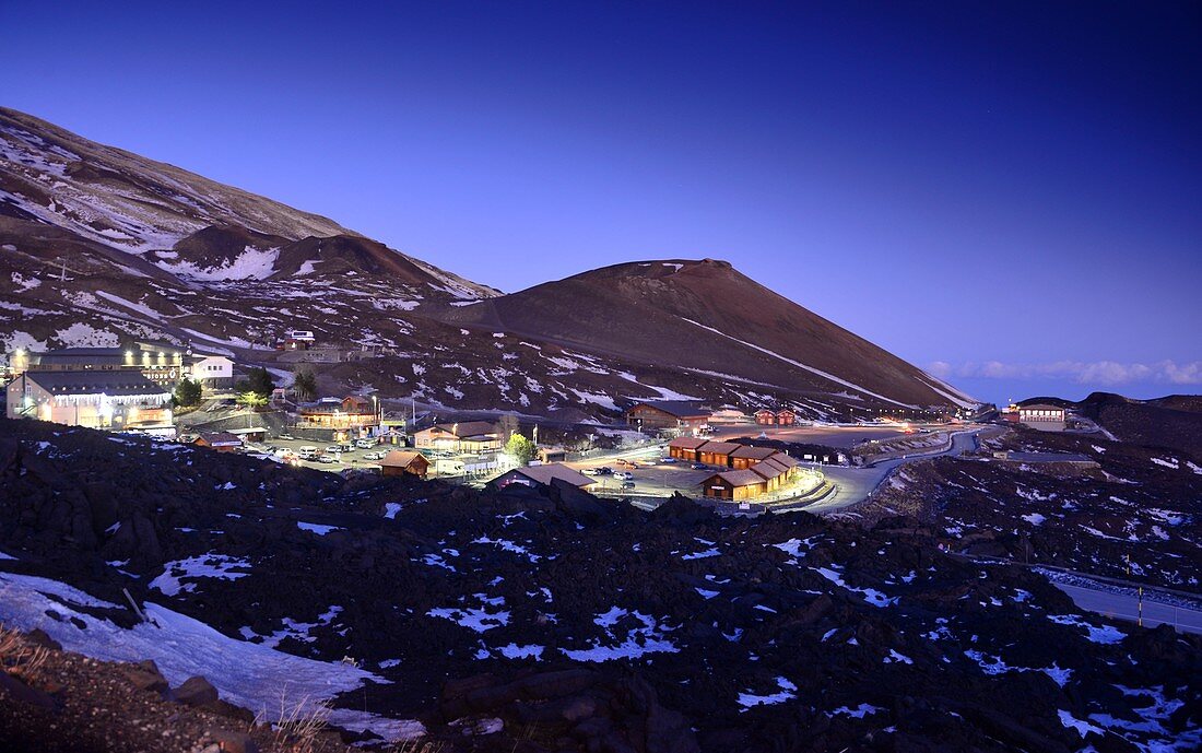 Rifugios, hotels, houses, evening under the Etna volcano, south side, east coast, Sicily, Italy