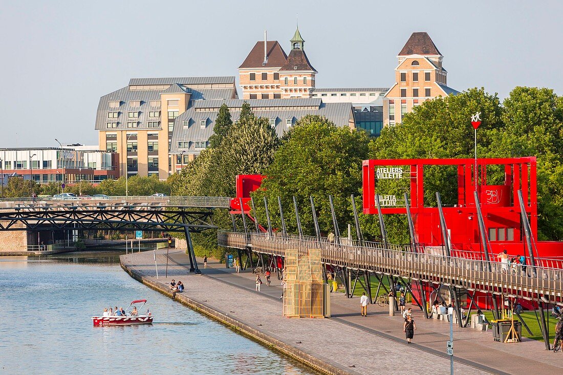 France, Paris, the Parc de la Villette, designed by architect Bernard Tschumi in 1983, the Ourcq canal, red buildings called Folies