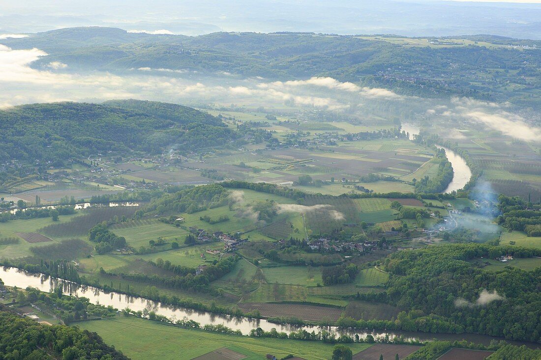 France, Dordogne, Perigord Noir, Dordogne Valley, the valley in the morning fog (aerial view)