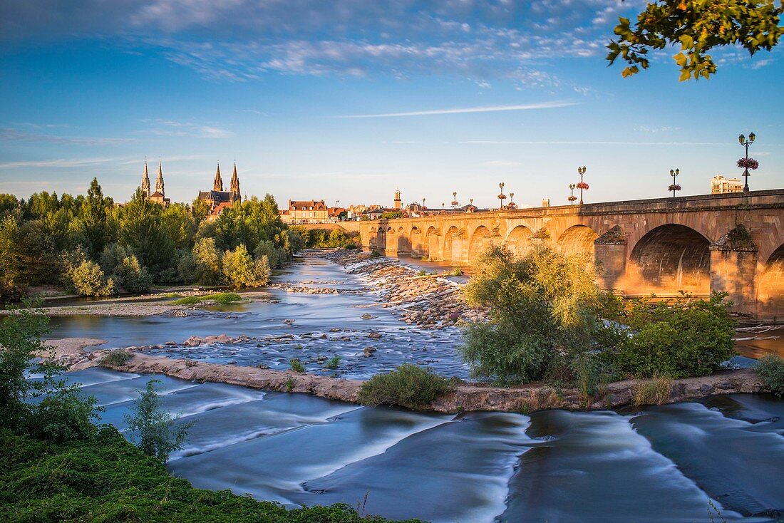 France, Allier, Moulins, view from the left bank of Allier river and Regemortes bridge, Sacred Heart church and Notre-Dame cathedral in the background