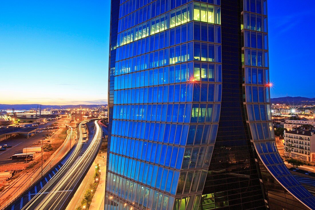 France, Bouches du Rhone, Marseille, Euromediterranee area, Grand Port Maritime Arenc district, the coastal highway (A55) and CMA CGM Tower, architect Zaha Hadid