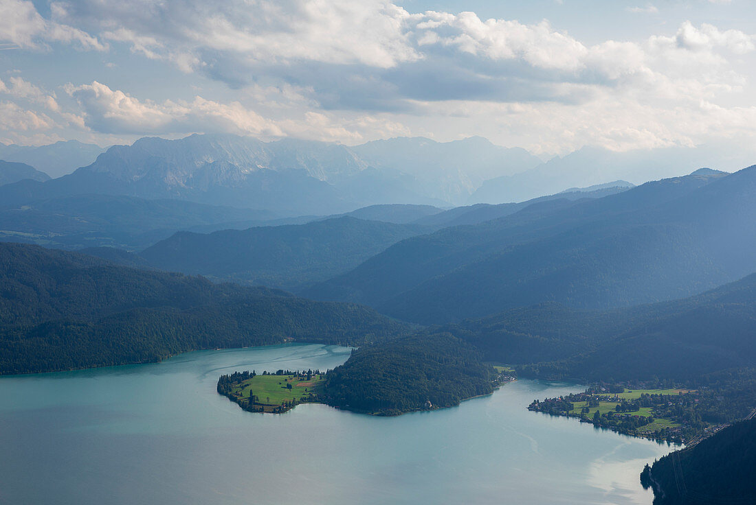 Turquoise Walchensee with dwarfs, mountains and clouds, Bavaria