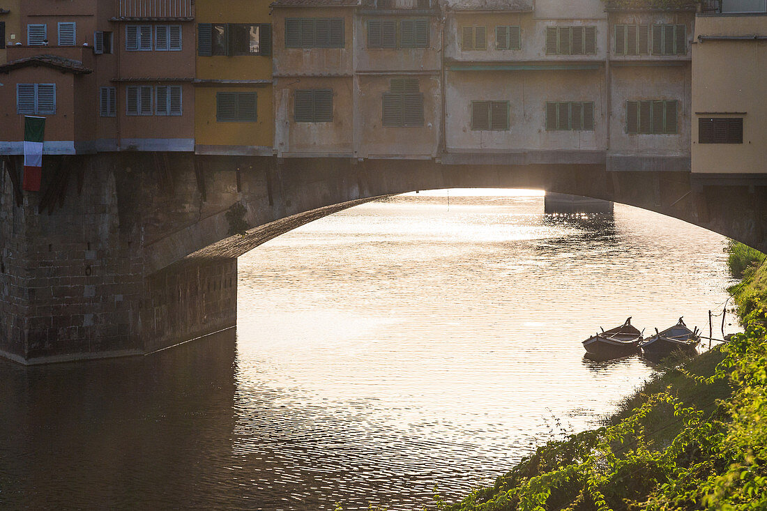 Sunset with a view of the Ponte Vecchio in Florence, Italy
