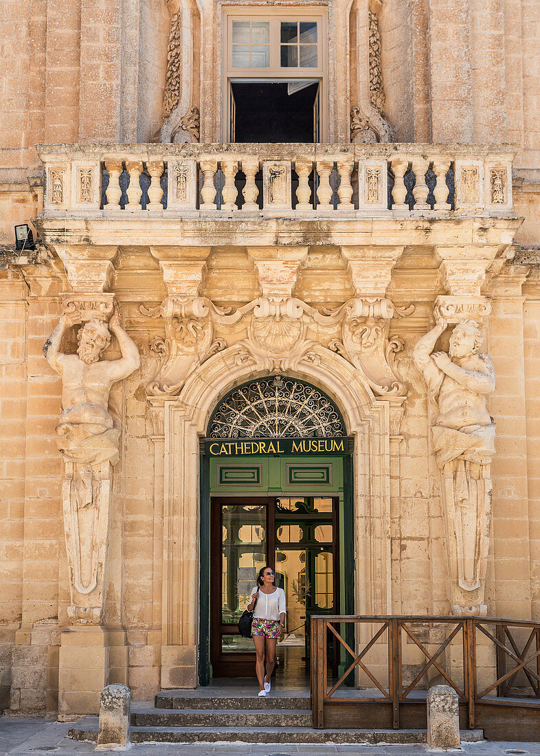 Tourists in front of the museum in Mdina, Malta