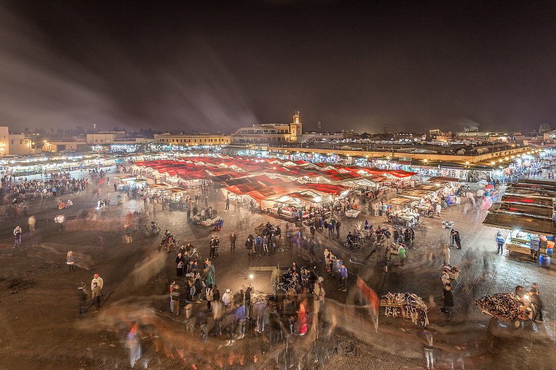 The Djemaa El Fna at night in motion, Marrakech, Morocco