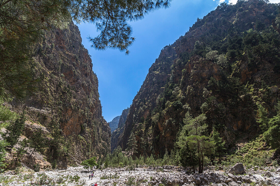 Imposing rock faces on hike in Samaria Gorge, West Crete, Greece