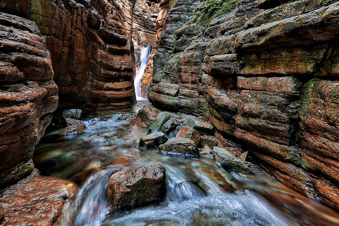 The canyon of Austria. A deep gorge with a waterfall in the Salzburg region. Long exposure