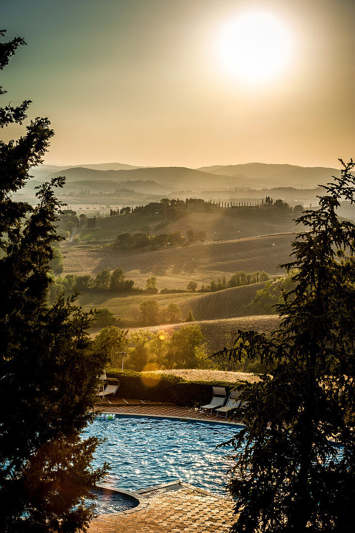 Pool in the evening light, Buonconvento, Tuscany, Italy