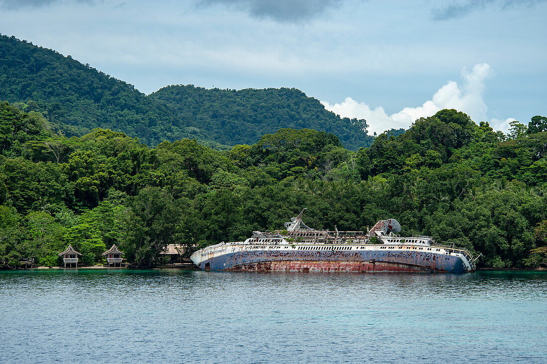 The wreck of the expedition ship World Discoverer has been lying on the edge of the jungle in Roderick Dhu Bay, Honiara, Roderick Bay, Nggela Islands, Solomon Islands, South Pacific since its stranding on April 30, 2000