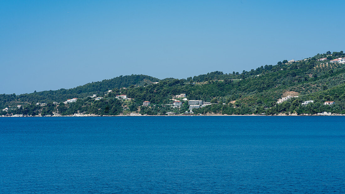 View of the forested island of Skiathos, Greece
