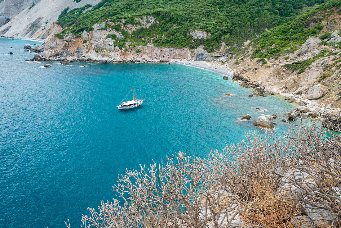 View of a boat on Kastro beach on Skiathos island, Greece