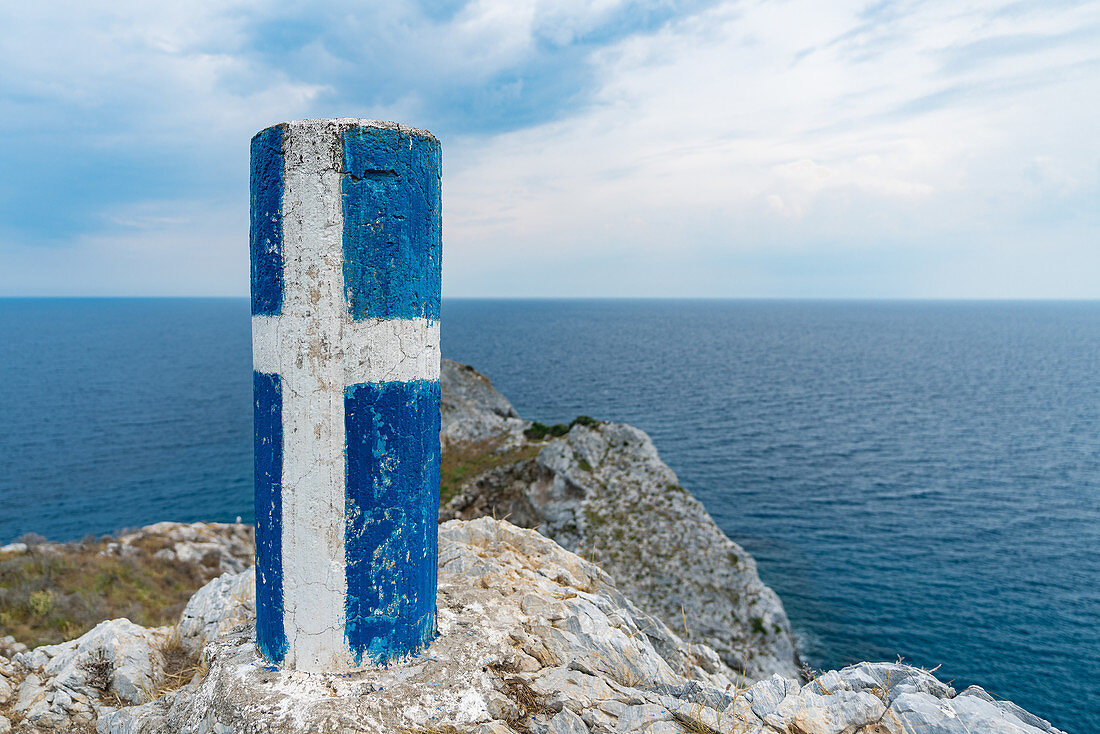Marker at the northernmost point of Skiathos Island, Greece