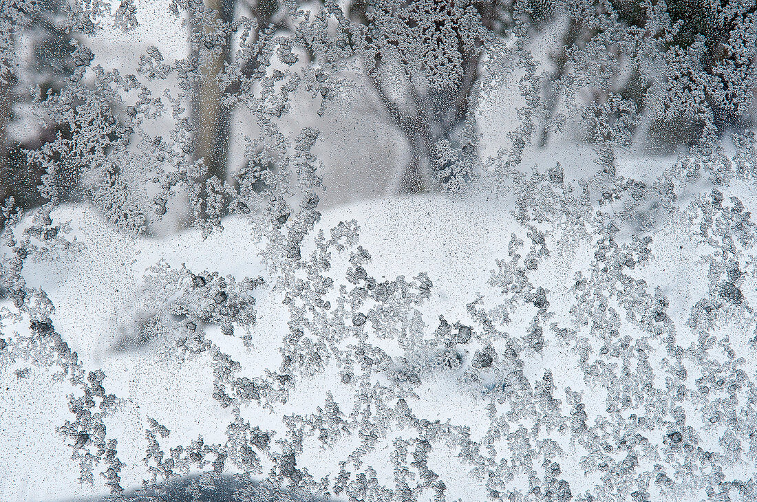Ice crystals have formed on the window of the Merrits ski lodge in the Thredbo ski area, NSW, Australia