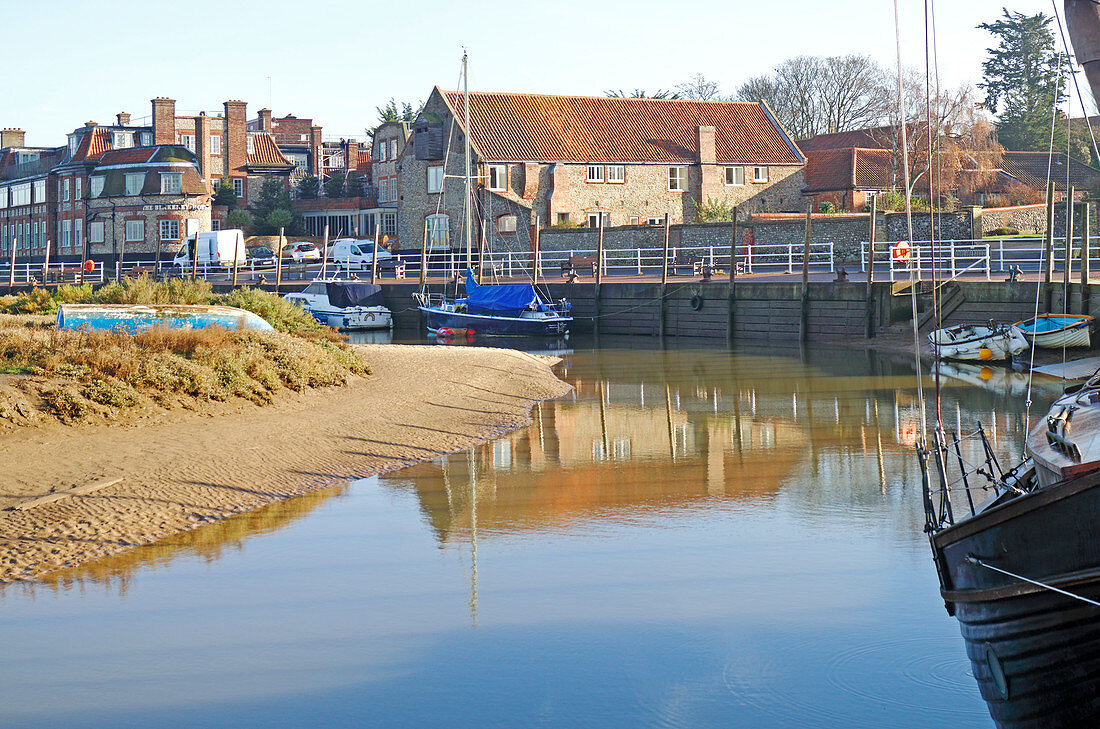 A view of the quayside on the North Norfolk coast at Blakeney, Norfolk, England, United Kingdom.