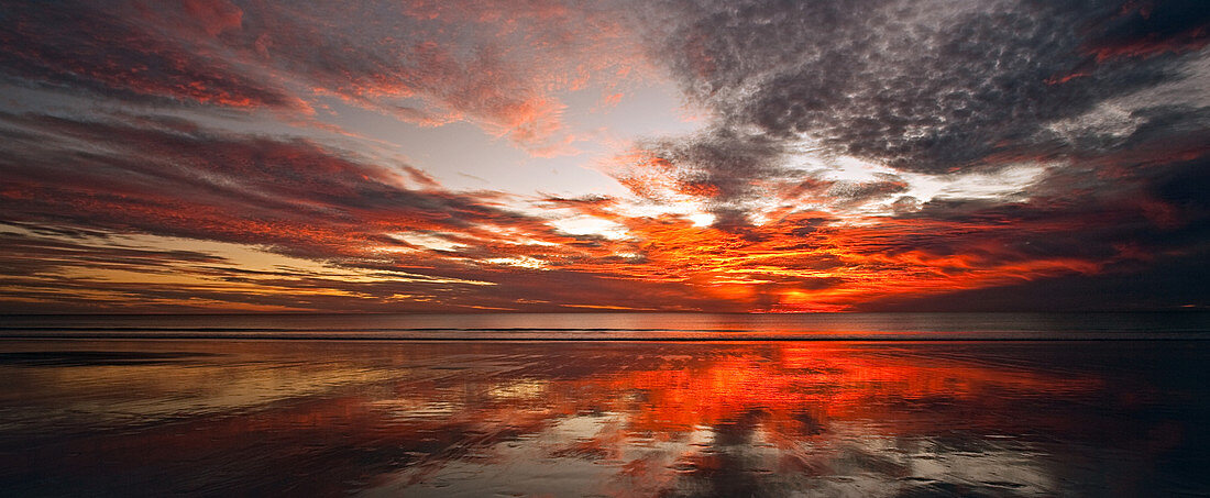 Broome, Australia - May 13, 2009: Red sky over Cable Beach.