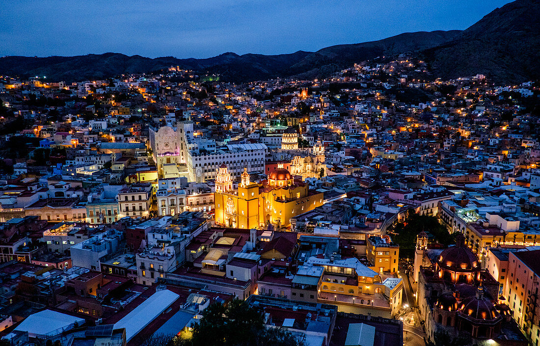 Guanajuato, Mexico - March 29, 2016: Overlooing the city of Guanajuato with the yellow Basilica in the center.