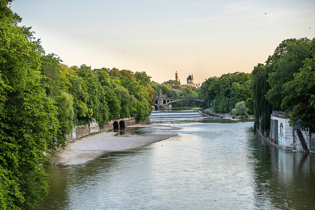 View from the Luitpoltbrücke towards the south down the Isar to the Maximiliansbrücke, the tower of the Muffathalle and the Müller'schen Volksbad, Munich, Bavaria, Germany
