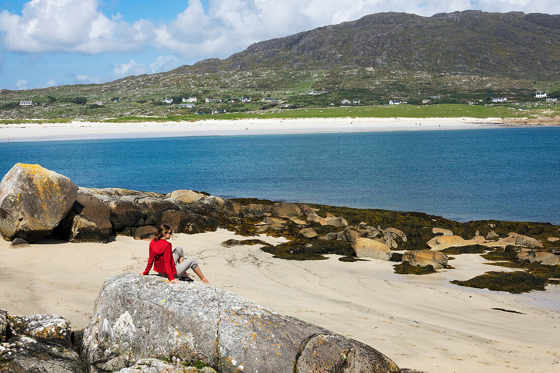 Girl on the beach at Gurteen Bay, Roundstone, County Galway, Ireland