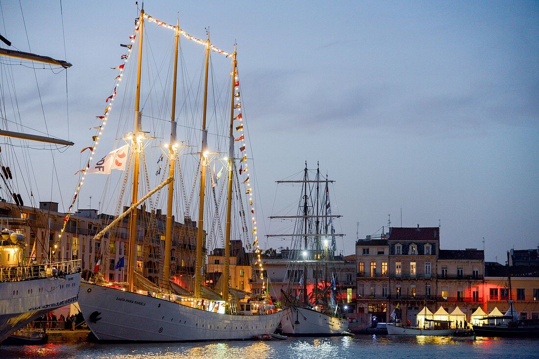 France, Herault, Sete, Escale a Sete Festival, Portuguese four-masted schooner Santa Maria Manuela in a harbor at dusk