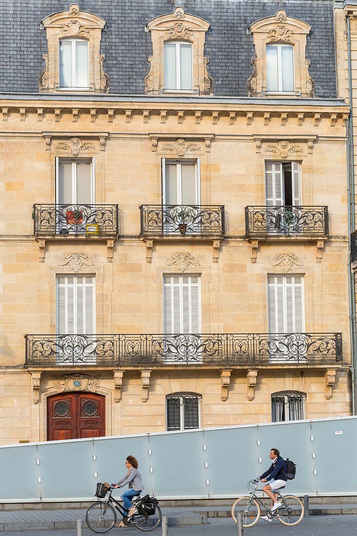 France, Gironde, Bordeaux, area listed as World Heritage by UNESCO, Place Pey-Berland, bikes in front of an 18th century building