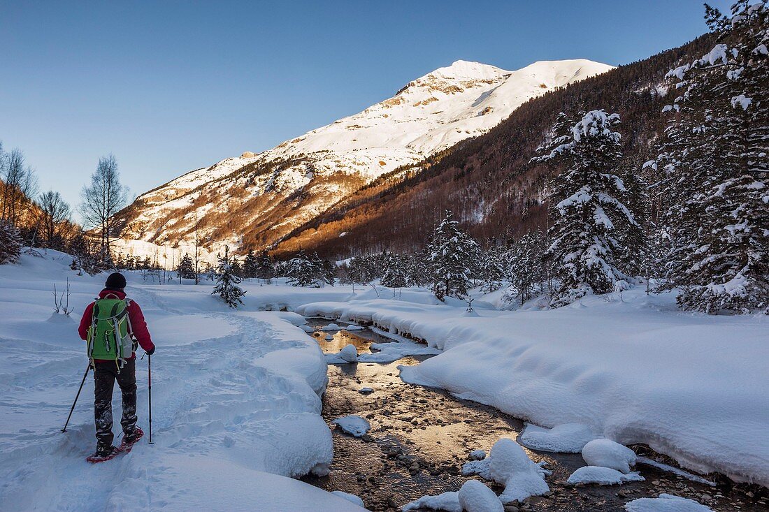 France, Hautes Pyrenees, Parc National des Pyrenees (Pyrenees National Park), Cirque de Gavarnie, listed as World Heritage by UNESCO, snowshoeing