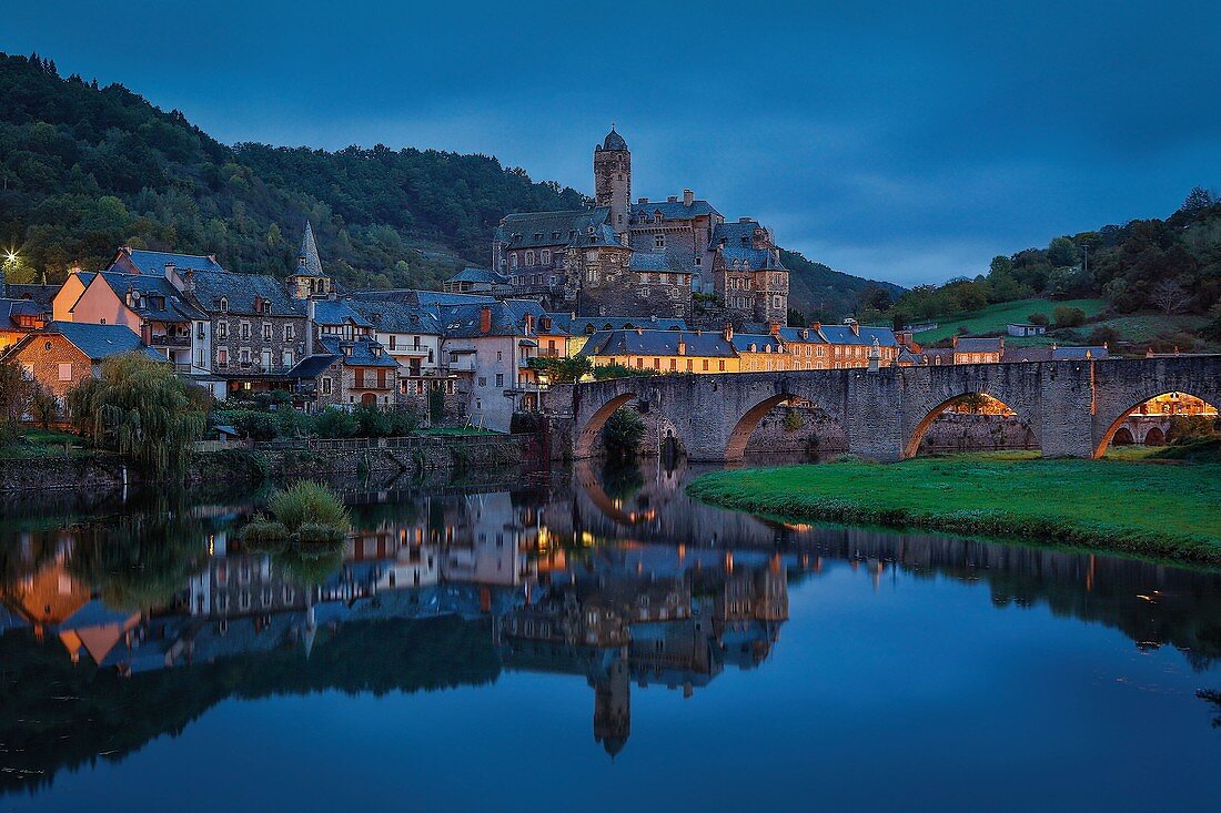France, Aveyron, Estaing, bridge isted as World Heritage by UNESCO, listed as The most beautiful villages in France, town and its bridge reflecting in the river Lot
